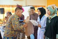 Asisten Adm Umum Musti Wakili Pj Bupati Langkat hadiri Capping Day Mahasiswa Akbid Langkat