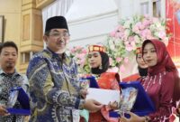 Bupati Hadiri Pelepasan Siswa/i dan Wisuda Tahfizul Qur’an SMAN 8 Tanjabbar 