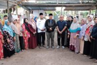 Bupati Tanjabbar Buka Turnamen Gasing di Seberang Kota