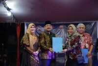 Bupati Hadiri Acara Tanjabbar Berbatik Dalam Rangkaian HUT Tanjabbar Ke-59 dan HUT-RI Ke-79