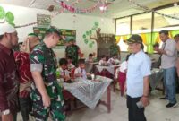KODIM 0203 LANGKAT MEMBERIKAN PROGRAM MAKAN GRATIS KE RATUSAN MURID DI LANGKAT KECAMATAN SELESAI DUSUN MELATI
