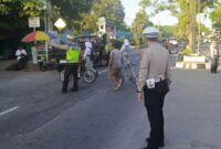 Satlantas Polres Langkat Atur Arus Lalu Lintas dalam Strong Point Pagi