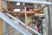 Satgas Yonif 700/WYC Gelorakan Semangat Kebersamaan: Pos Bendungan Bantu Pembangunan Patung Misionaris Gordon F. Larson