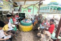 Belajar Tanpa Batas, Satgas Yonif 521/DY Hadirkan Perpustakaan Untuk Kecerdasan Anak Bangsa dan Tumbuhkan Minat Belajar Di Distrik Walesi