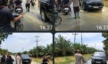 Personel Polsek Padang Tualang, Polres Langkat, Polda Sumatera Utara, bergerak cepat melakukan pengaturan lalu lintas di tengah kondisi banjir