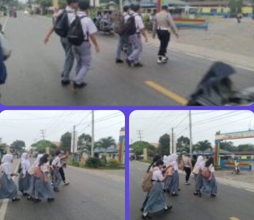 Pengaturan Lalu-lintas pagi hari memberikan pelayanan kepada anak-anak Sekolah dan masyarakat Pengguna Jalan.